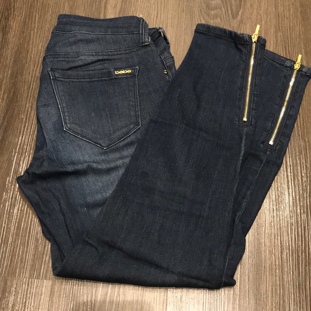 Bebe stretch skinny jeans with ankle gold zippers
